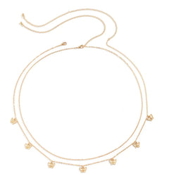 Gold necklace with small floral pendants on a white background