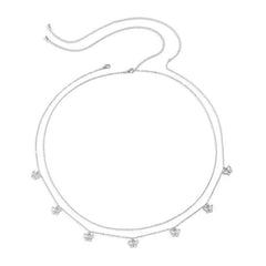 Silver necklace with small pendants on a white background