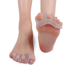 Silicone toe separators on a foot against a white background