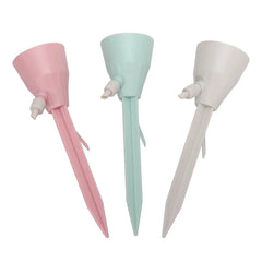 Three pastel-colored funnel-shaped watering stakes on a white background