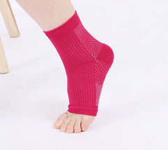 Red ankle support brace on a white background