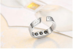 Silver ring on a soft white background