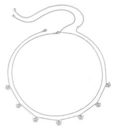 Silver necklace with small pendants on a white background