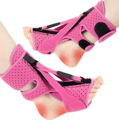 Pink foot brace with black straps on a white background