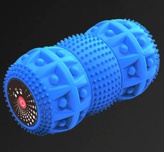 Blue massage roller ball with textured surface on a black background