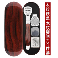 Wooden foot care tool set with a wooden case on a white background