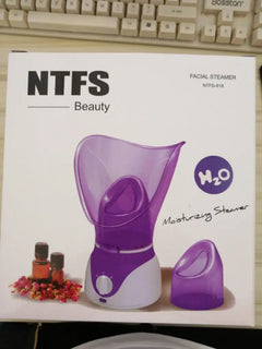 Facial steamer with 'NTFS Beauty' branding on a white background