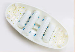 White plastic device with blue and yellow components on a white background