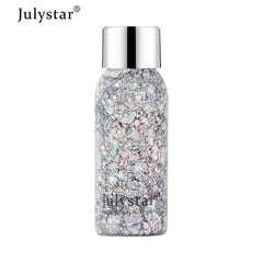 Glittery makeup product bottle with silver cap on a white background, featuring the Julystar brand.