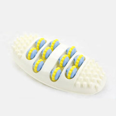 White foot massager with yellow and blue rollers on a white background