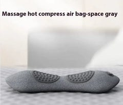 Gray massage hot compress air bag on a light background