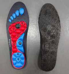 Magnetic shoe insole with red and blue design on a gray surface