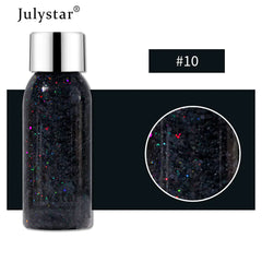 Bottle of glitter with a close-up detail on a white background, featuring the brand 'Julystar'.