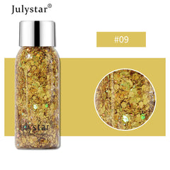 Julystar glitter bottle with silver cap on a white background