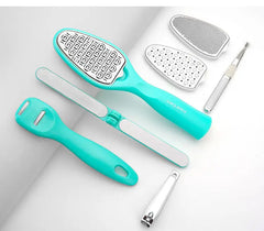 Set of grooming tools including a teal brush, white comb, and other small instruments on a light gray background.