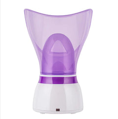 Purple and white facial steamer on a white background