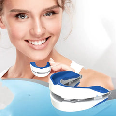 Woman holding a dental device with a close-up of the device in the foreground.